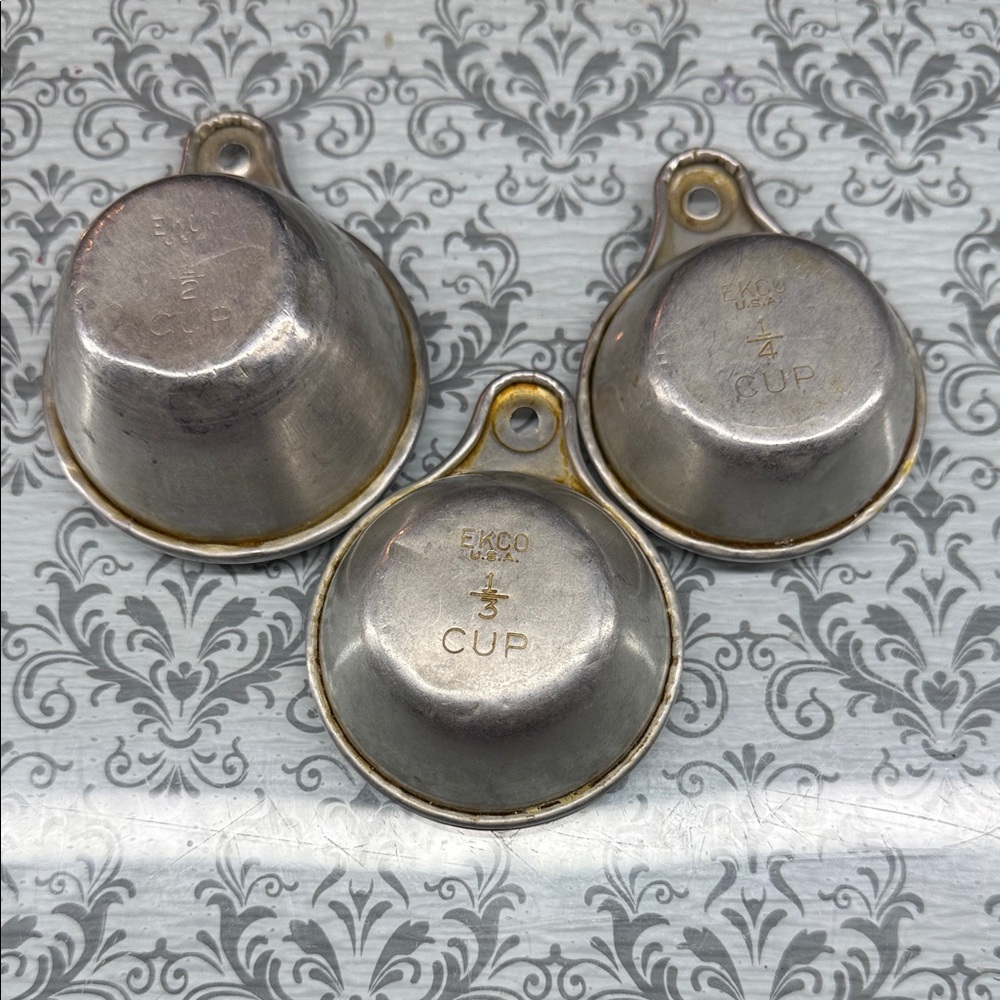 Antique EKCO Silver Measuring Cups Set
